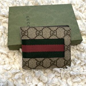 Men’s Gucci monogram wallet